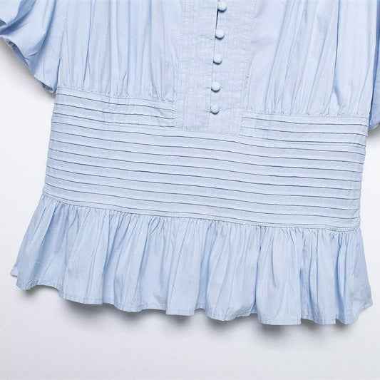 Ruffle-Trimmed Sleeveless Blouse