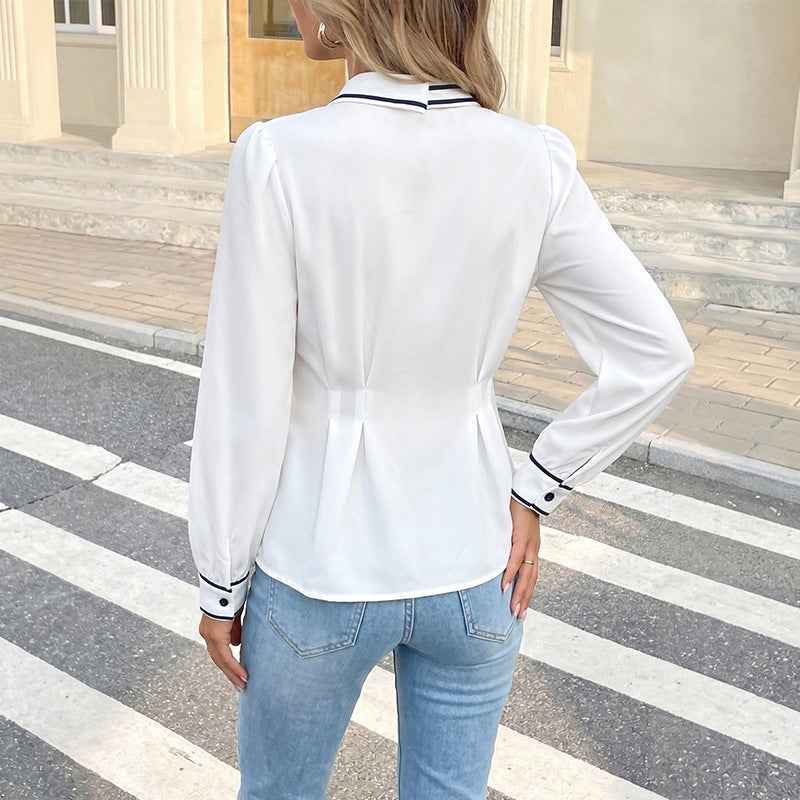 White Shirt With A Fluttering Collar And Contrasting Trim