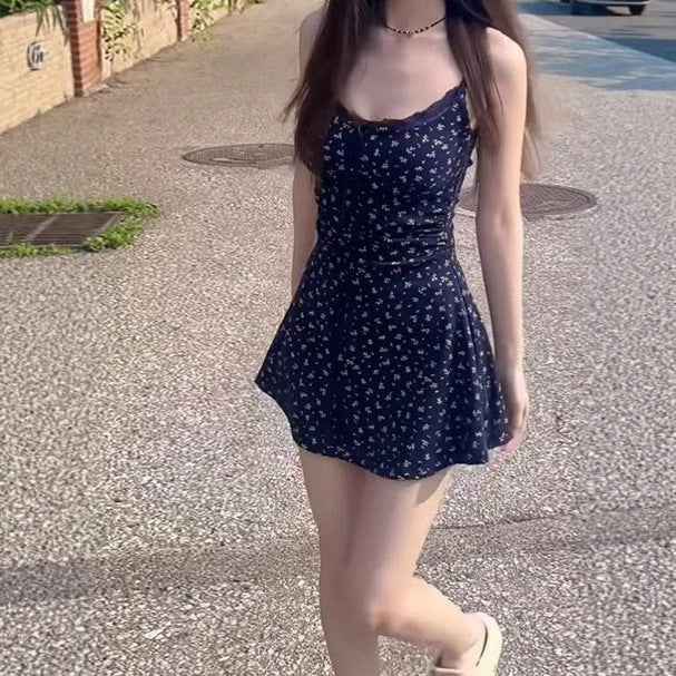 Floral Print Sleeveless High-Waist A-Line Mini Dress with Tie Detail