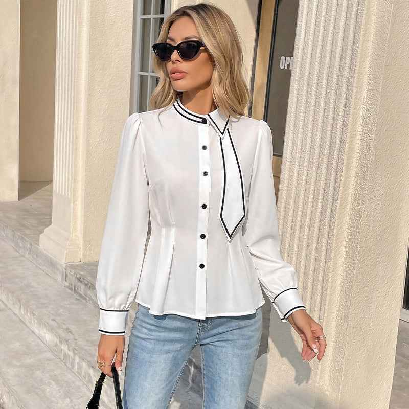 White Shirt With A Fluttering Collar And Contrasting Trim