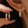 2026 New Micro Paved Zircon Gold Twist Earrings For Women Luxury Niche Elegant Ear Cuffs