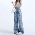 High-Waisted Flared Denim Pants – Painted Wash