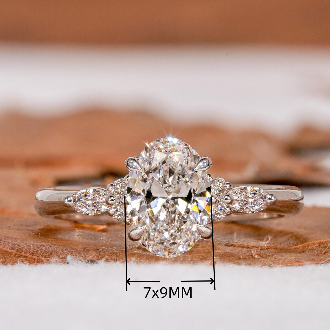 Clear-Look Oval Stone Statement Ring - oval centre and side accents